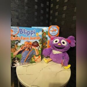 Blippi: lot of three animal book, book disc player, and brand new stuffy set